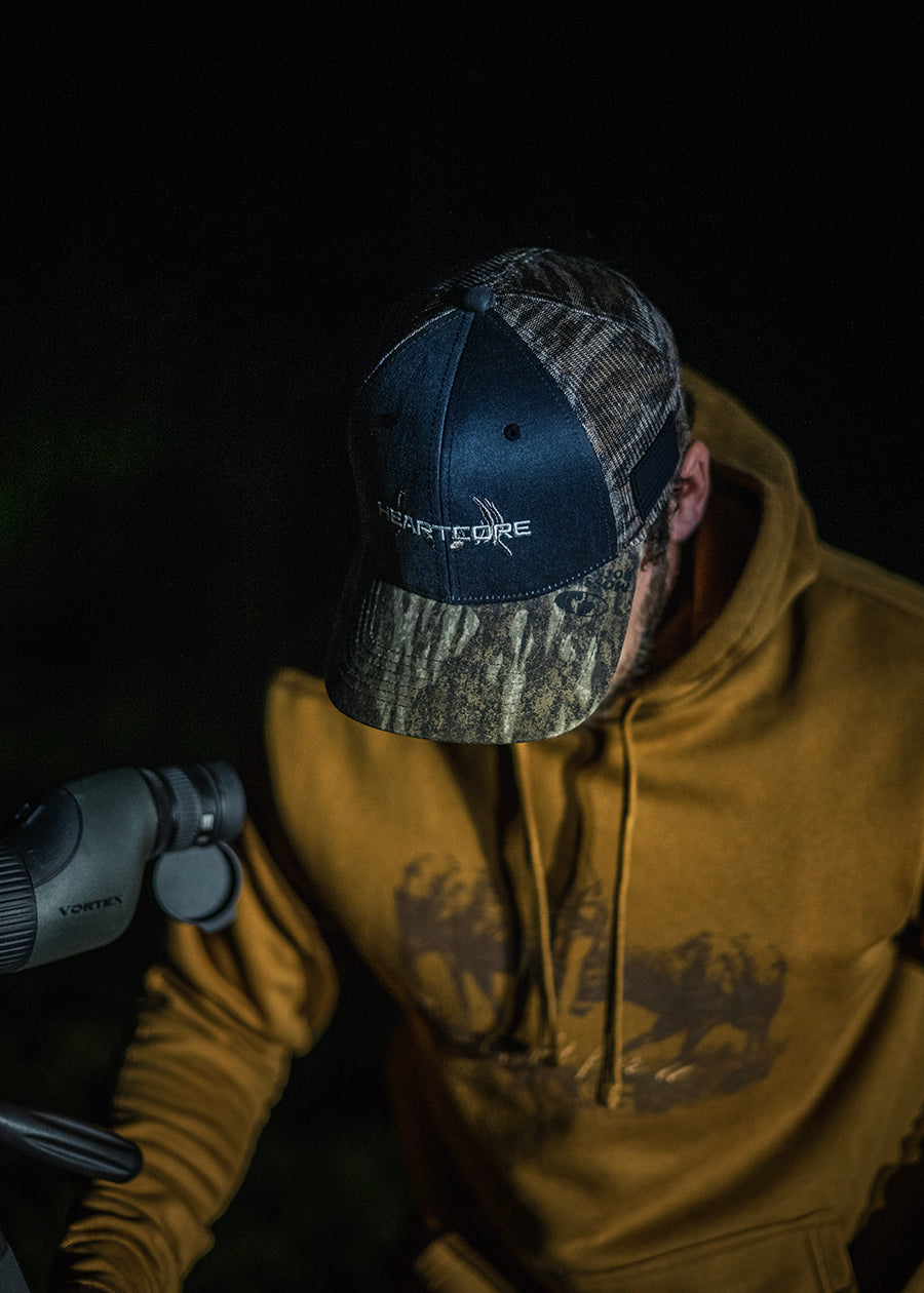 Mossy Oak New Bottomland Trucker Hat with Side Flag Patch